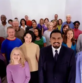 Group of people looking at camera, smiling Group of people looking at camera, smiling