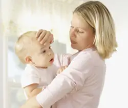 Mother holding infant