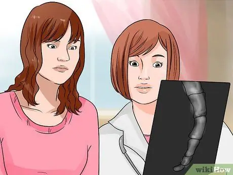 Облегчить боль в копчике Шаг 1