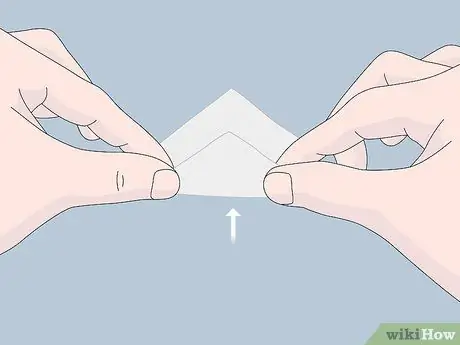 Сложите марлю для рта Шаг 3