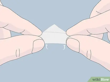 Сложите марлю для рта Шаг 5