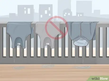 Вешать одежду на балкон Шаг 11