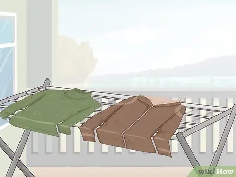 Вешать одежду на балкон Шаг 4
